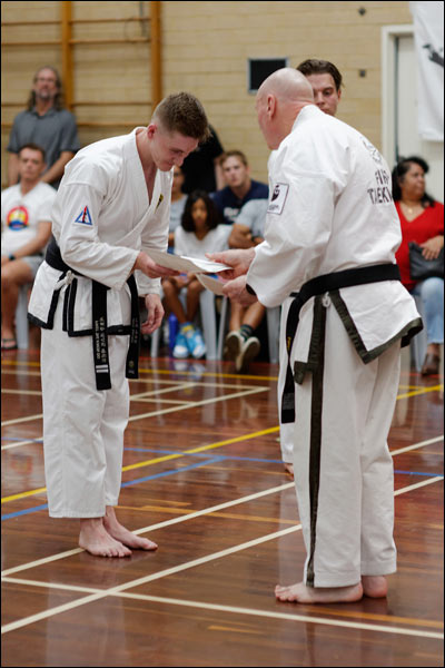 First Tae Kwon Do Chief Instructor John O'Brien presenting 2nd Dan certificate, March 2023, Perth